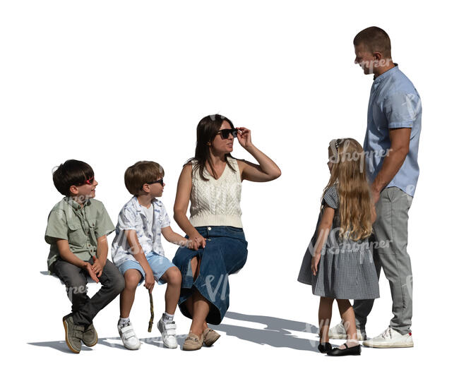 woman and kids sitting and talking to friends standing by