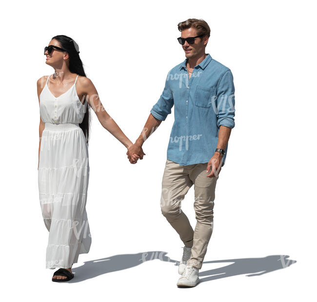 couple walking hand in hand in summer