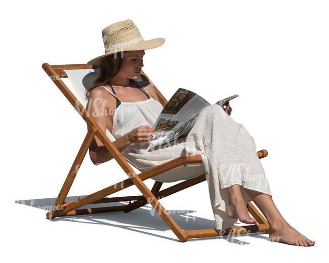 woman sitting in a beach chair and reading a newspaper