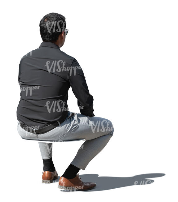 cut out man in formal business outfit sitting outside