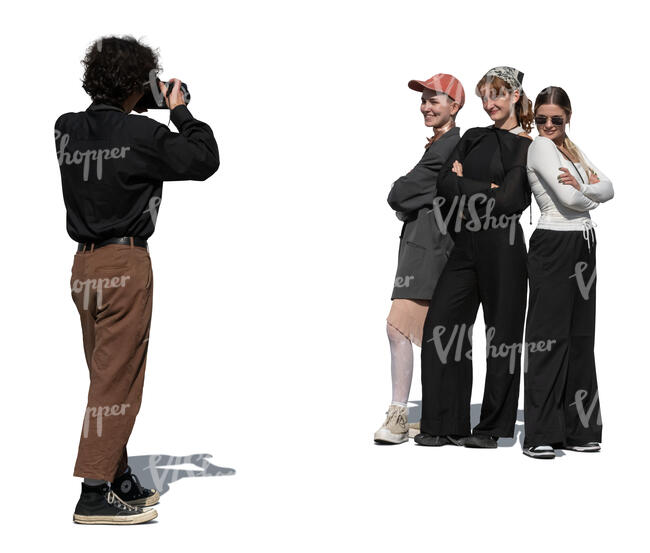 man taking a photo of a group of girls
