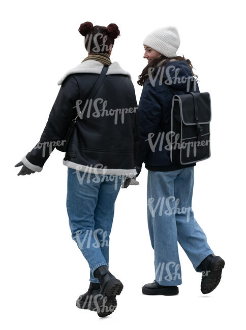 two young women walking in winter