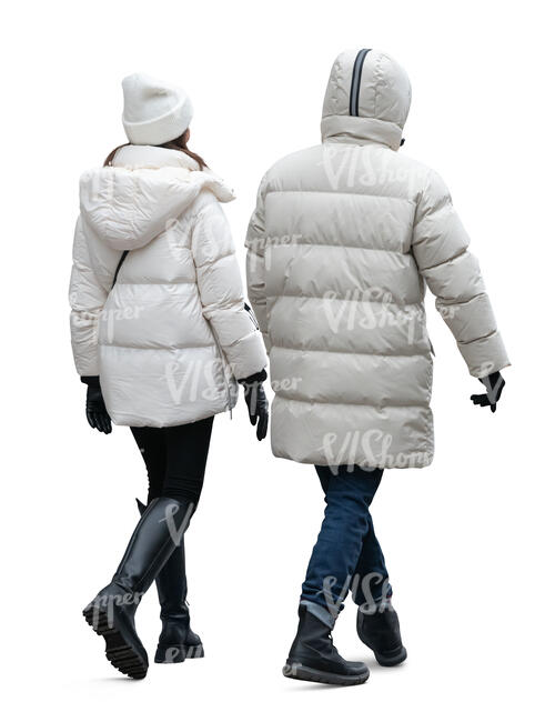 two people in white winter jackets walking