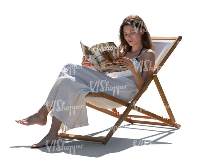 woman relaxing in the garden chair and reading