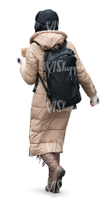woman in a long puffer coat walking