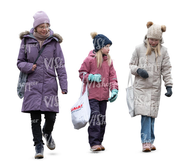 woman and two girls walking in winter