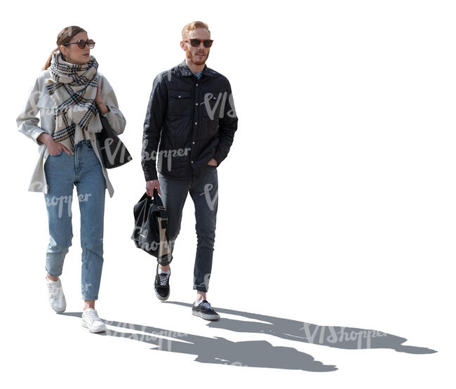 two cut out backlit people walking