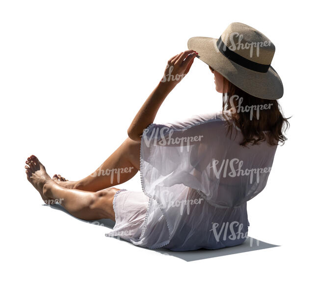 woman at a resort lying in a beach chair
