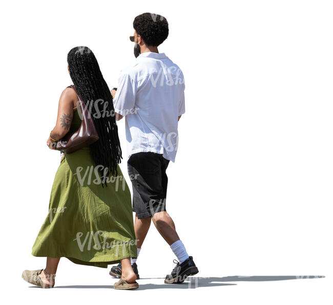dark haired couple walking