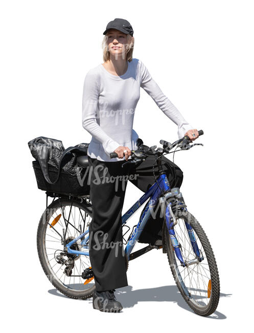 woman with a baseball hat riding a bike
