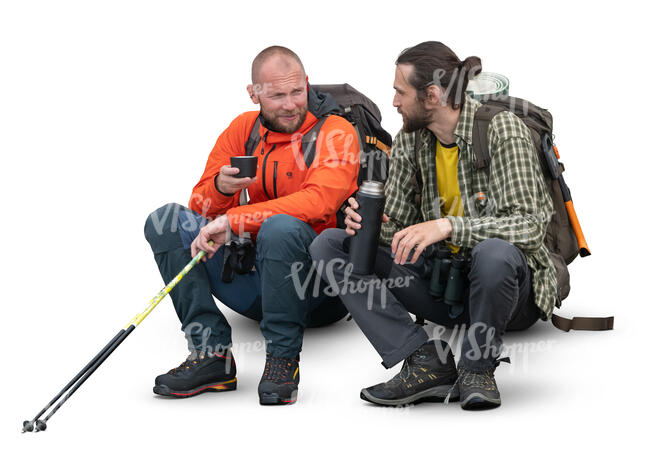 two cut out hikers sitting and drinking tea