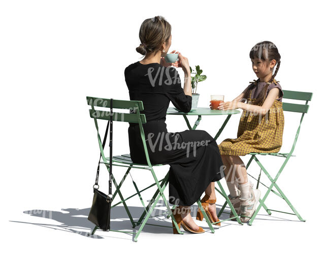 cut out japanese woman and her daughter sitting in a street cafe