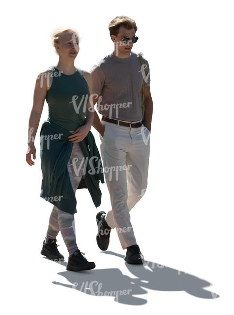 two cut out people walking in backlight