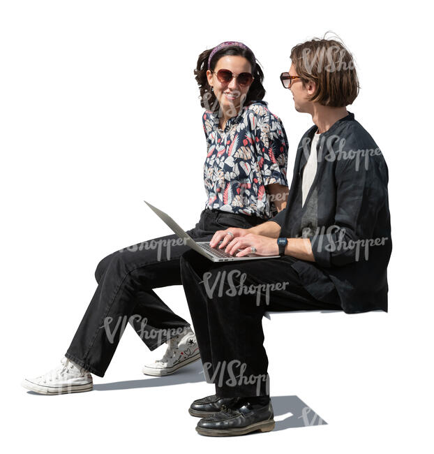 cut out man and woman with a laptop sitting outside