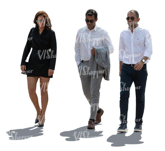 cut out backlit group of three people walking
