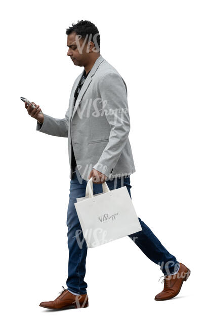 indian businessman with a shopping bag and phone walking