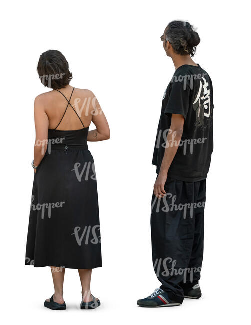 man and woman standing and looking at smth