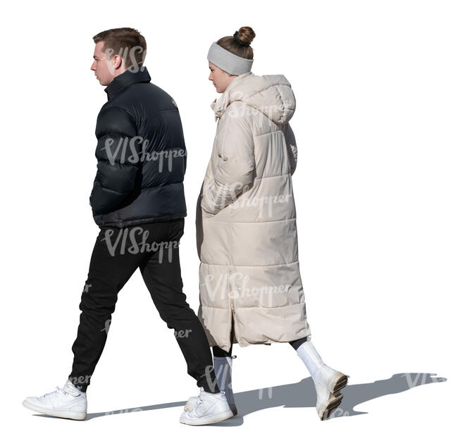 two people walking on a sunny winter day