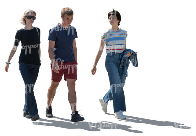 cut out backlit group of three people walking