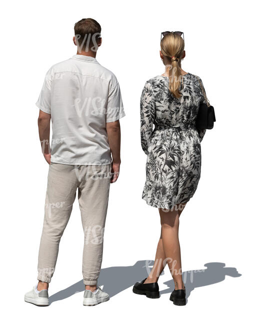 man and woman standing seen from behind