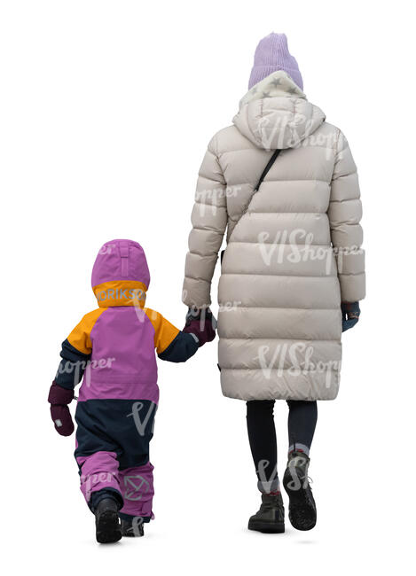 mother and daughter walking hand in hand in winter