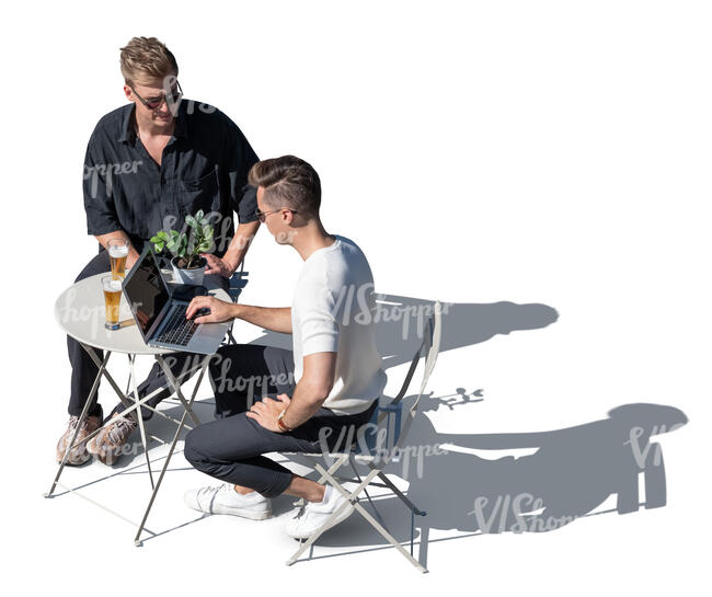 top view of two men sitting in a cafe