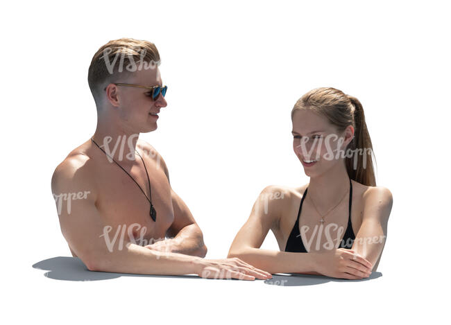 two people relaxing in the pool