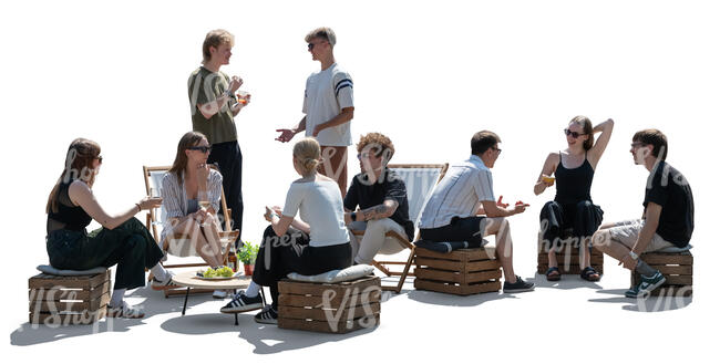 cut out backlit scene of people hanging and relaxing outside