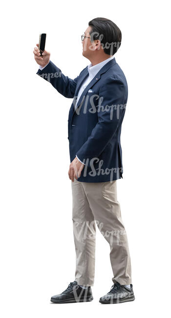 asian businessman taking photos with his phone