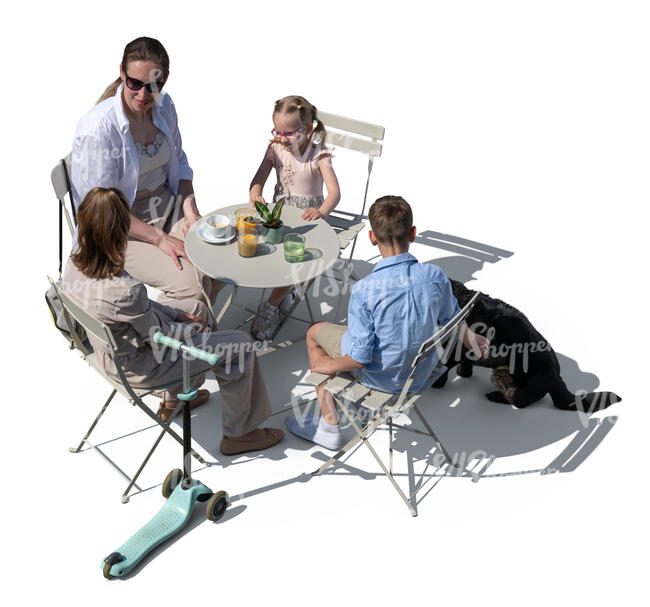 top view of a woman with kids and a dog sitting in a restaurant