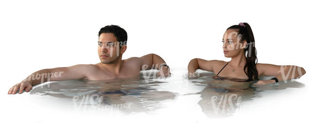man and woman relaxing in the hot tub