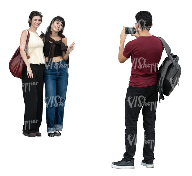 cut out man taking a picture of two women
