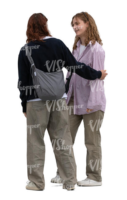 two women standing and talking