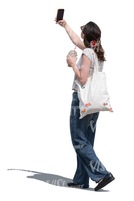 cut out woman walking in the street and taking pictures