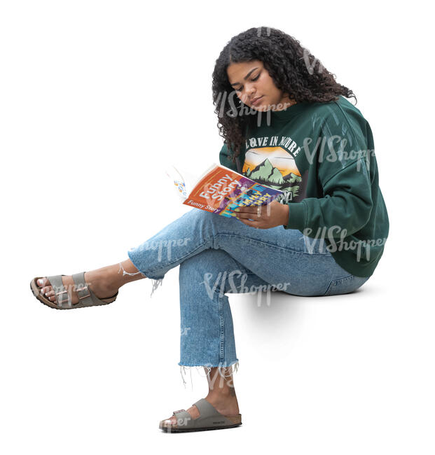 teenage girl sitting and reading a book