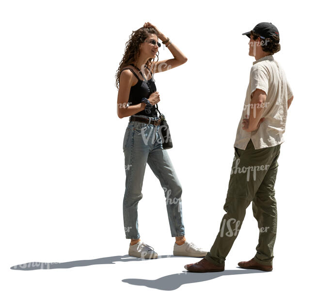 two people standing and talking in backlight