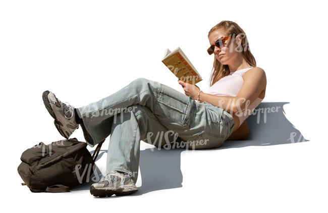 cut out woman sitting outside and reading