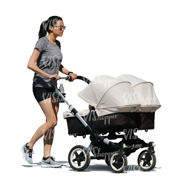 woman with twin carriage walking