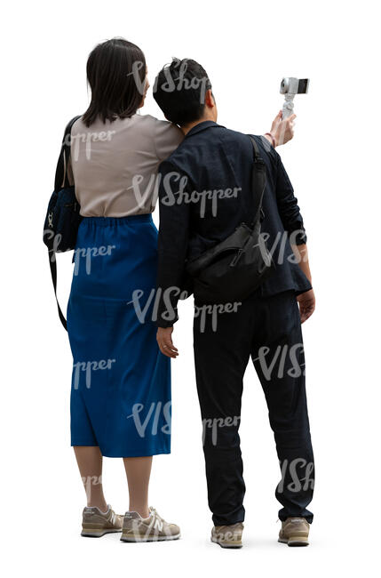 two asian people taking a selfie