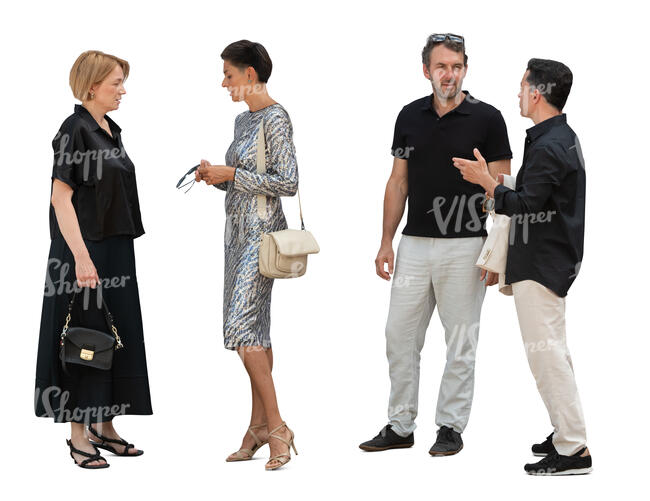 men and women standing and talking at a party