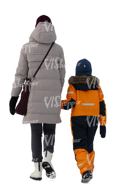 mother and son walking hand in hand in winter