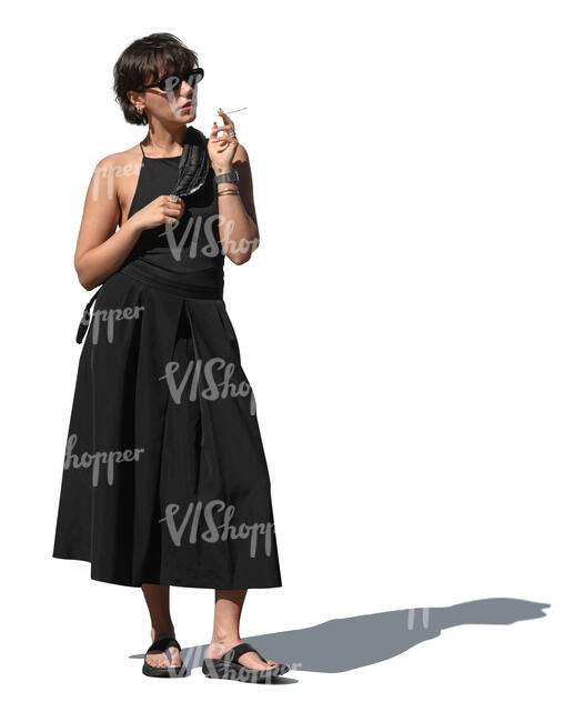 cut out woman in a black dress smoking