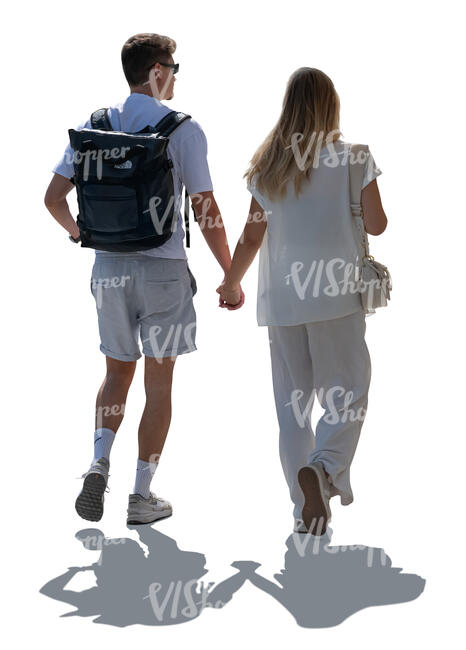 backlit man and woman walking in summer