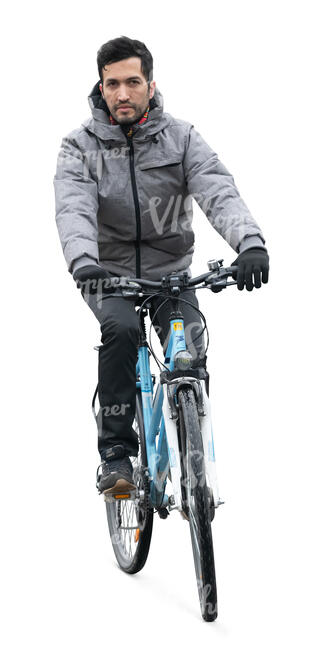 cut out spanish man in a grey autumn jacket riding a bike