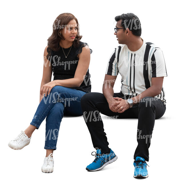 man and woman sitting on a bench and talking