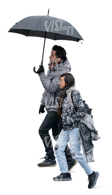 man and woman with an umbrella walking in the rain up the stairs