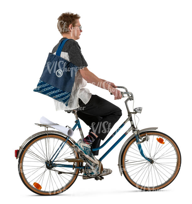 profile view of a young man riding a bike