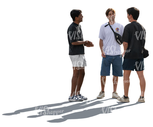 backlit multinational group of boys standing