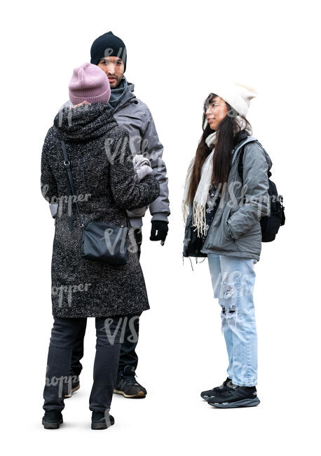 group of three people standing  and talking in autumn