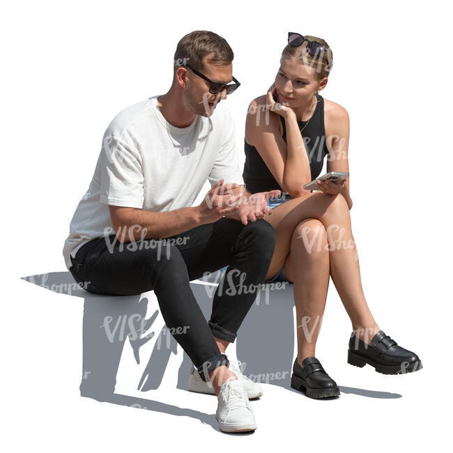 two people sitting and having a conversation